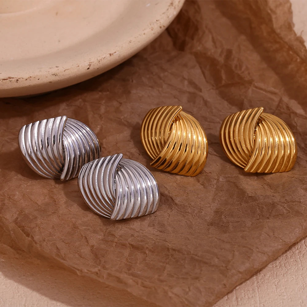 Uptown Girl Earrings on display paper